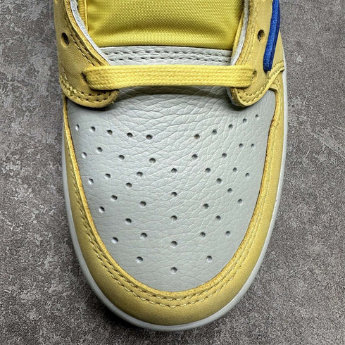 AIR JORDAN - JORDAN 1 RETRO LOW OG WMNS "TRAVIS SCOTT - CANARY" - Hanorio