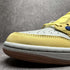 AIR JORDAN - JORDAN 1 RETRO LOW OG WMNS "TRAVIS SCOTT - CANARY" - Hanorio